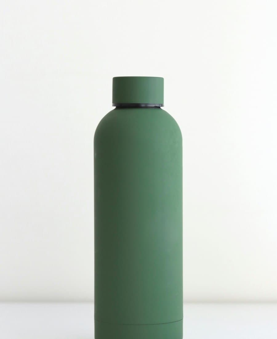 A matte cream-colored insulated stainless steel water bottle.